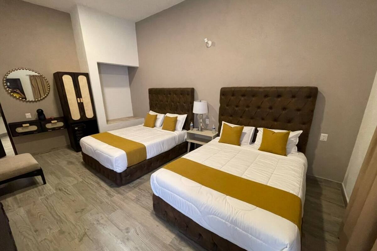 Deluxe Quadruple Room, Mountain View | Iron/ironing board (on request), WiFi (free)