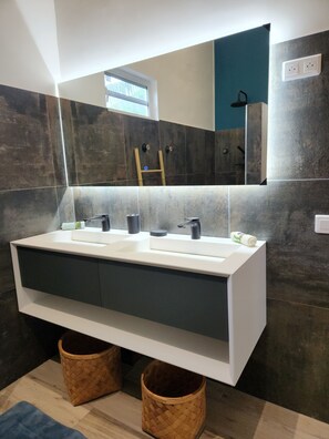Shower, hair dryer, towels, soap