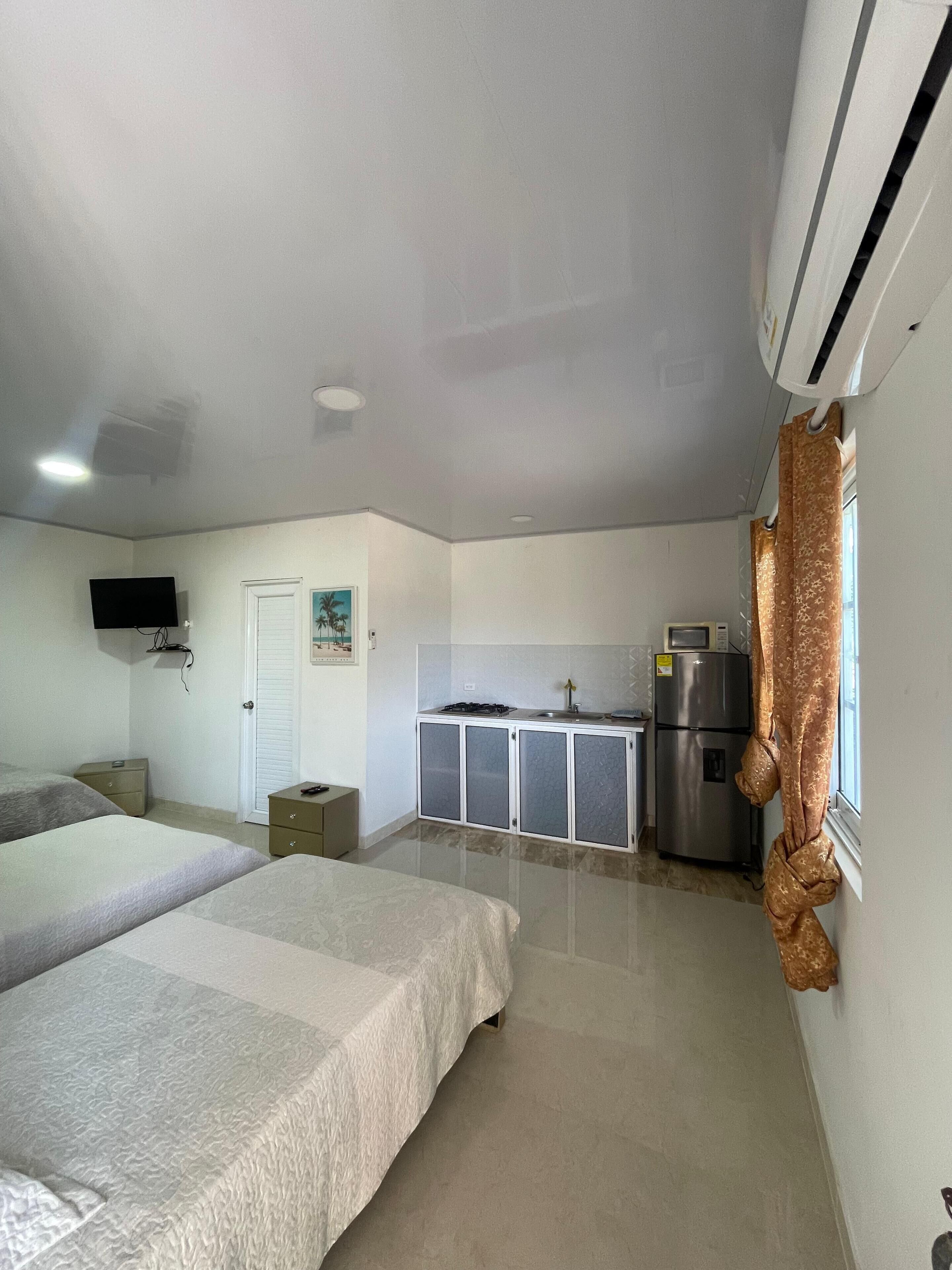 Comfort Quadruple Room, Courtyard View | Blackout drapes, free WiFi, bed sheets