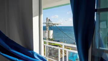 Chambre Quadruple Supérieure, 2 lits doubles, vue océan | Rideaux occultants, Wi-Fi gratuit, draps fournis