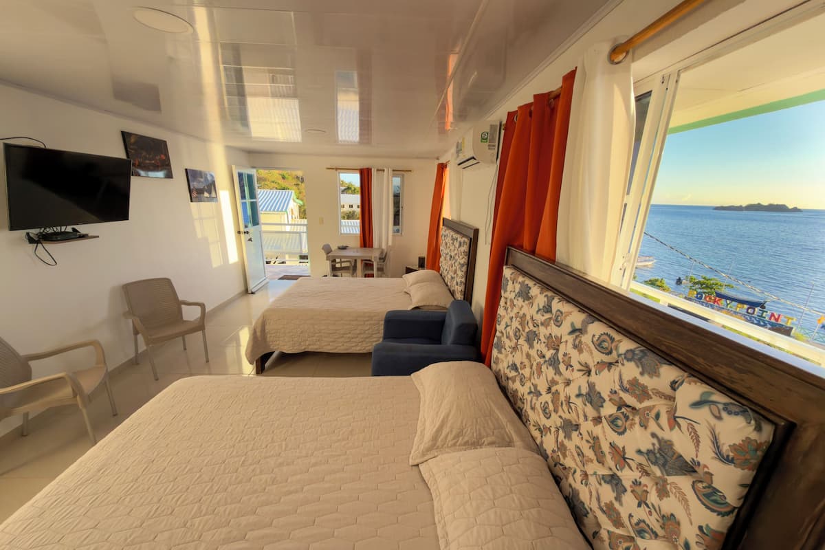 Superior Dört Kişilik Oda, 2 Çift Kişilik Yatak, Okyanus Manzaralı | Güneşlik/perde, ücretsiz kablosuz İnternet, çarşaf takımı