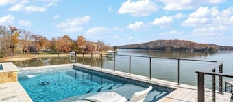 Luxurious Lakefront Home with a Private Saltwater Pool, Spa, & Deep-Water Dock