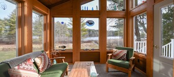 Lakeside Home with 450 feet of Private waterfront on Thompson Lake