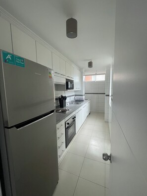 Microwave, oven, stovetop, dishwasher -
Modern 2D 2B Apt • Wi-Fi, Parking, Fully Equipped • Metro Manquehue -Las Condes (Las Condes)