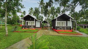 Premium Cottage, Balcony, Ocean View | In-room safe, desk, laptop workspace, iron/ironing board