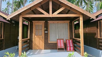 Premium Cottage, Balcony, Partial Sea View | In-room safe, desk, laptop workspace, iron/ironing board