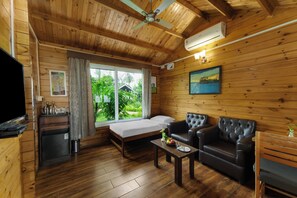 Cottage Deluxe, balcon, vue océan | Coffres-forts dans les chambres, bureau