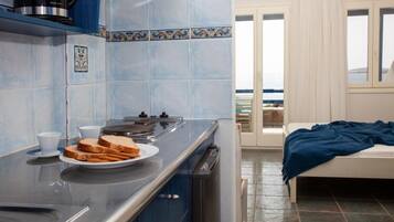 Fridge, coffee/tea maker, electric kettle, toaster