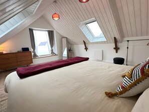 1 habitación, tabla de planchar con plancha, wifi gratis y ropa de cama 