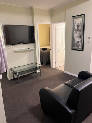 Family Suite | Living area | Netflix, streaming services