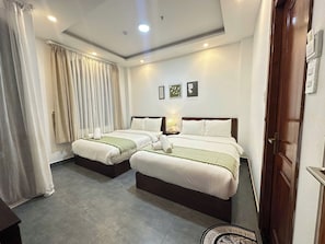 Chambre familiale double | Minibar, système d’insonorisation, accès au Wi-Fi (inclus)