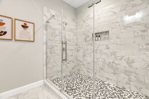 Shower, hair dryer, towels, soap