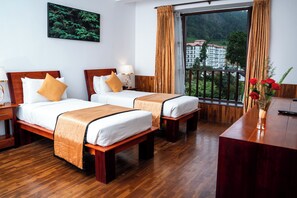 Deluxe kamer, 1 twee- of 2 eenpersoonsbedden | Luxe beddengoed, bedden met traagschuimmatras, een kluis op de kamer