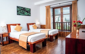 Habitación Deluxe con 1 cama matrimonial o 2 individuales | Ropa de cama de alta calidad y camas con efecto memoria 