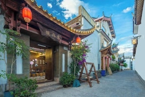 Traditional Chinese architecture with a curved roof and ornate details.
