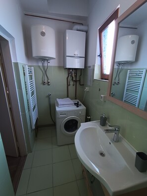 Hair dryer, towels, soap, shampoo
