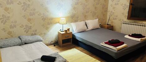 2 bedrooms, desk, iron/ironing board, travel cot