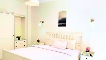 2 chambres, coffres-forts dans les chambres, fer et planche Ă repasser