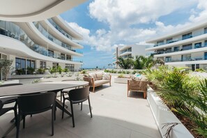 Outdoor dining - Beachfront 2BR LUX Condo ONE Mambo 11 by Bocobay (Curaçao | Mambo Beach)