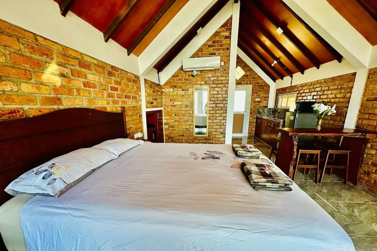 Deluxe Villa, 1 Queen Bed, Ocean View | 1 bedroom, minibar, desk, free WiFi