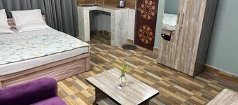 Spacious 9-bedroom building with WiFi, AC in charming Guwahati