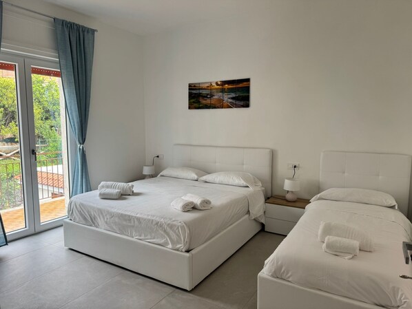 2 habitaciones, tabla de planchar con plancha, wifi y ropa de cama