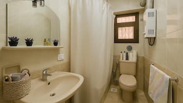 Hair dryer, bidet, towels, soap