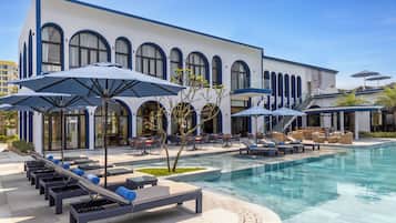 2 outdoor pools, pool umbrellas, pool loungers