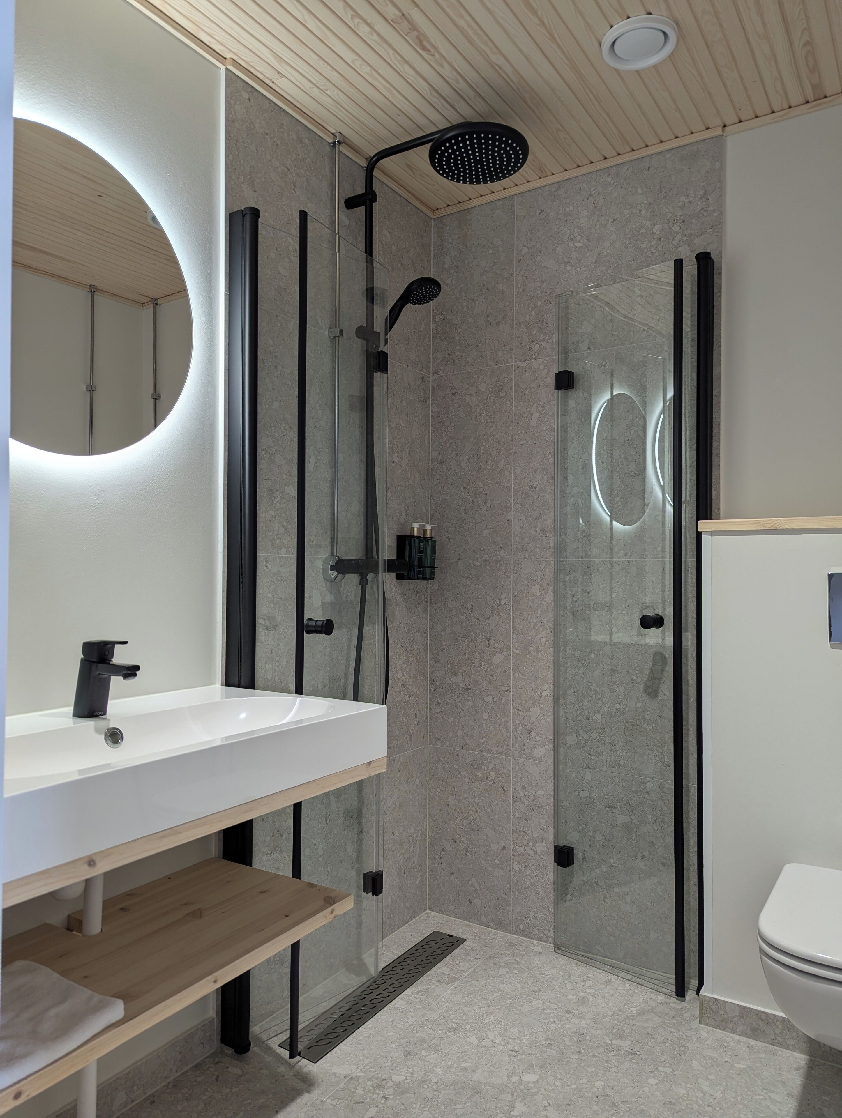 Shower, rainfall showerhead, hair dryer, towels