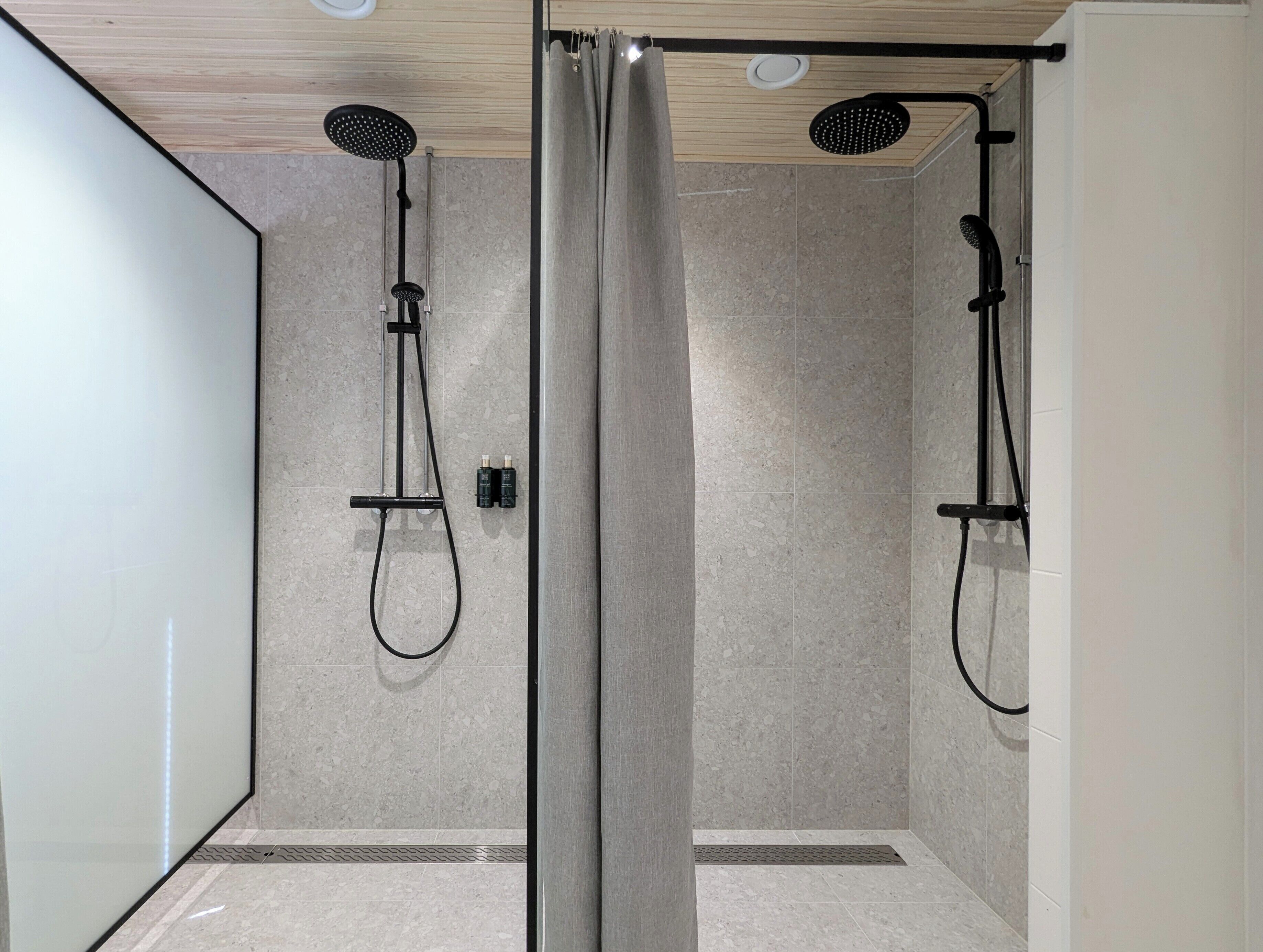 Shower, rainfall showerhead, hair dryer, towels