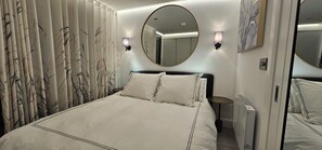 1 habitación, tabla de planchar con plancha, wifi y ropa de cama 