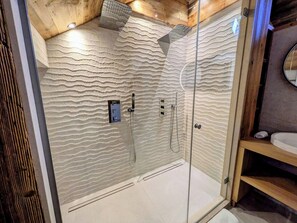 Shower, towels, soap, toilet paper