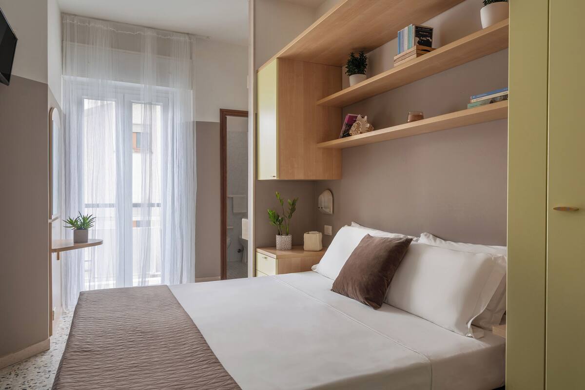 Economy kamer, 1 twee- of 2 eenpersoonsbedden, balkon | Een kluis op de kamer, gratis wifi, beddengoed