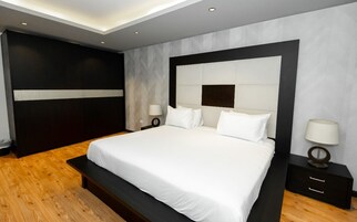 Luxury Apartment, 4 Bedrooms, Pool View | Premium bedding, in-room safe, desk, iron/ironing board