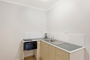 Fridge, microwave, toaster, cookware/dishes/utensils