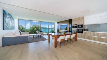 Design Condo, 3 Bedrooms, Sea View | Living area | Flat-screen TV