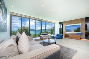Design Condo, 3 Bedrooms, Sea View | Living area | Flat-screen TV