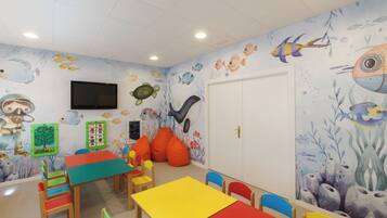 Área de juegos infantiles techada