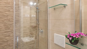 Shower, hair dryer, towels