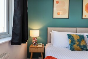 4 slaapkamers, een strijkplank/strijkijzer, wifi, beddengoed