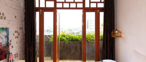 Chambre Design, 2 chambres, balcon, vue sur le jardin | Vue du balcon