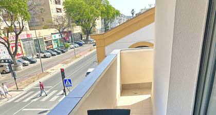 Bright Apartment with Wraparound L-Shaped Balcony