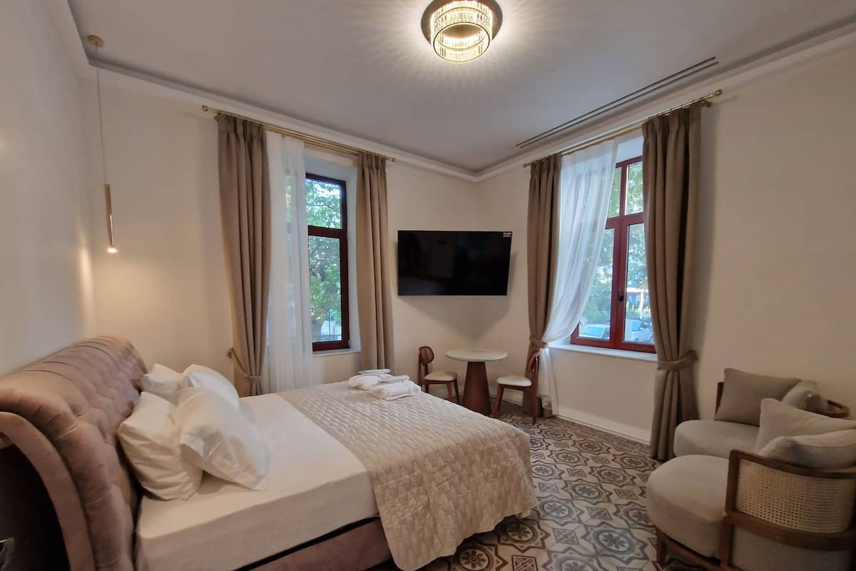 Comfort Suite | 1 bedroom, down comforters, free minibar, in-room safe