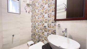 Shower, free toiletries, towels, soap