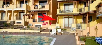 Charming 2-bedroom apartment in welcoming Lu Bagnu with WiFi, AC