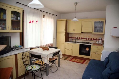 Charming 2-bedroom apartment in welcoming Lu Bagnu with WiFi, AC