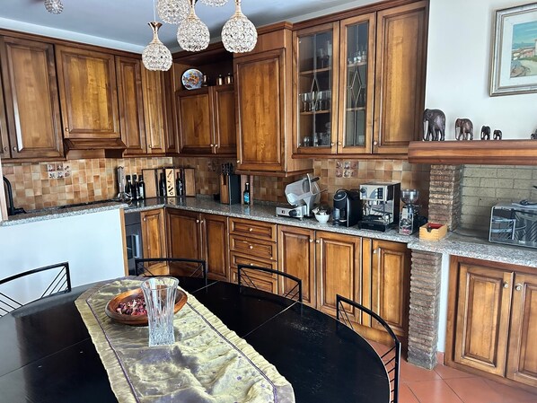 Condo, Balcony, Garden View | Private kitchen | Fridge, microwave, oven, stovetop