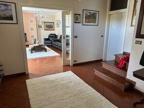 Condo, Balcony, Garden View | Living area | 32-inch flat-screen TV with cable channels