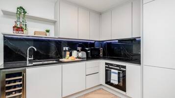 Apartment | Private kitchen | Fridge, microwave, oven, stovetop