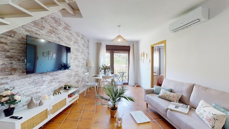 City Apartment | Living area | Flat-screen TV